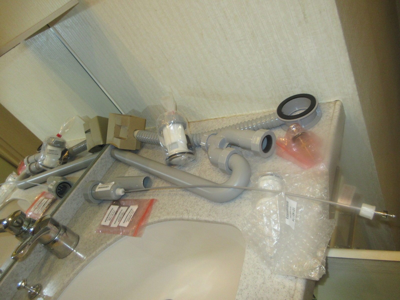 洗面排水栓のフタを開閉する棒が動かない修理 交換部品写真